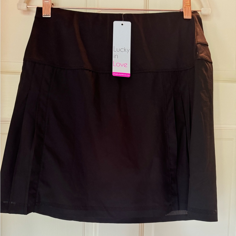 Lucky in love fabulous pleated skort, never worn new with tags.   Size:small